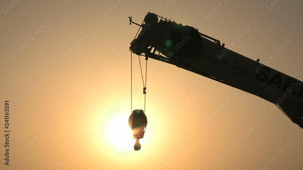 construction crane silhouette in construction site