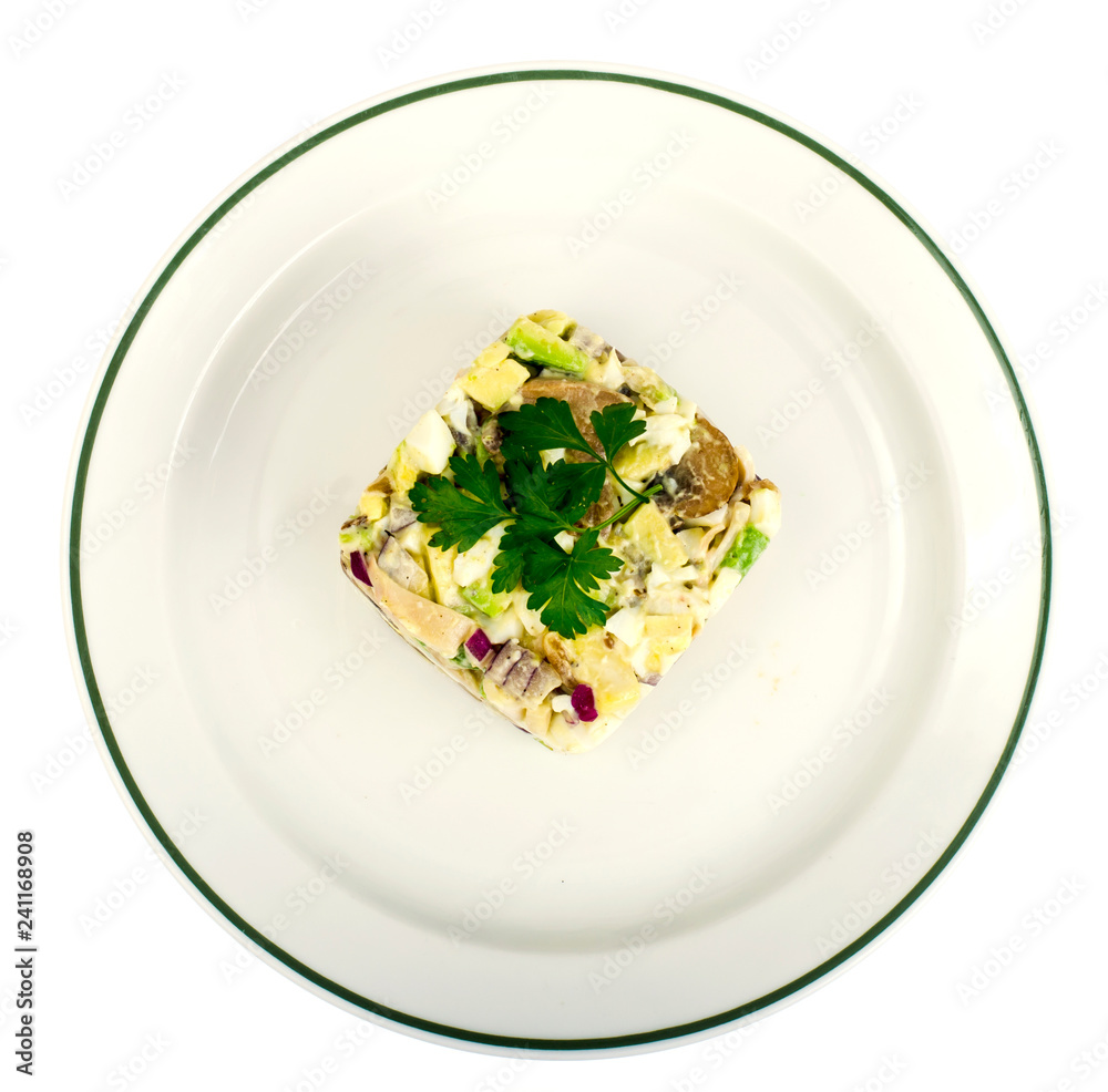 Salad with chicken and avocado on plate isolated on white background Salad with chicken and avocado on plate isolated on white background