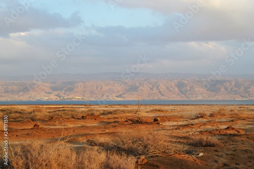 Desert area at dusk, sunset on the shore of dead sea, Judean desert, Israel