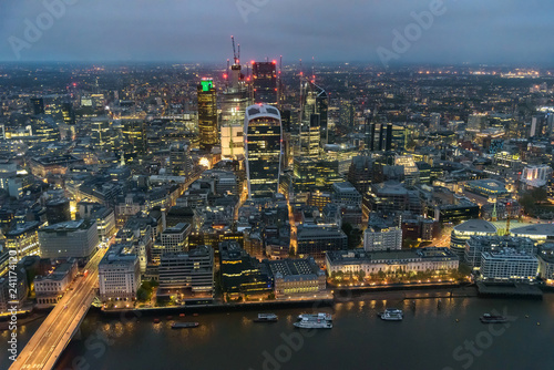Aerial view of City of London at night © mkos83