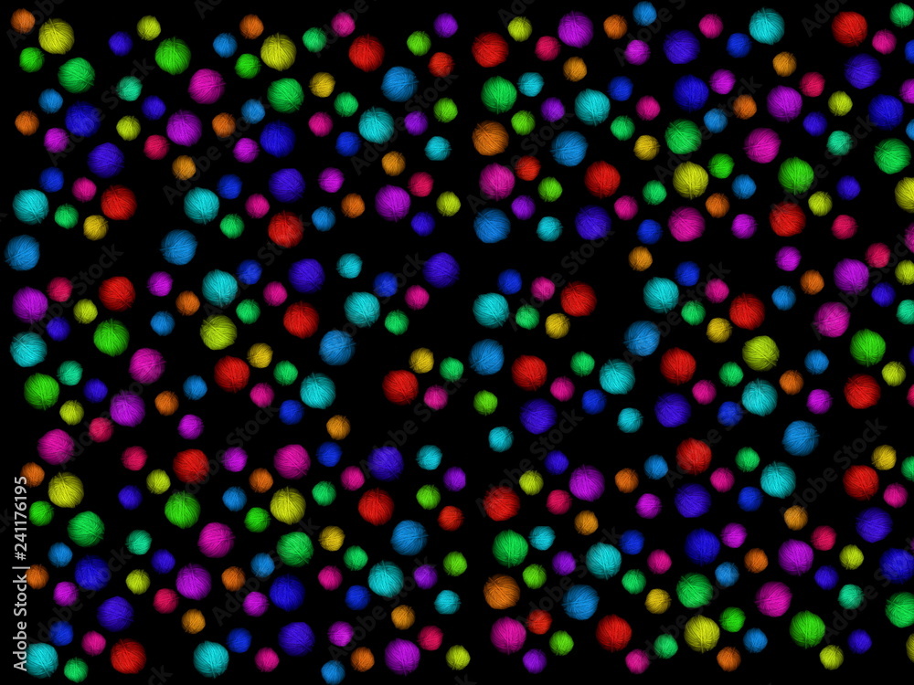 Multi-colored skeins of wool on a black background. Multicolored balls. Colored wool in the balls. Multi-colored skeins of wool on a black background. Multicolored balls. Colored wool in the balls.