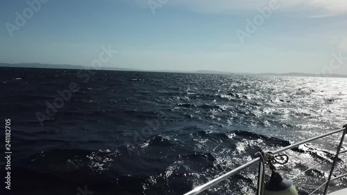 Helm shot from sailboat on the lake in New Zealand