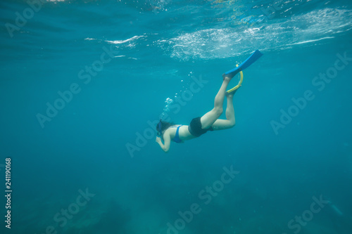 Underwater picture of a Girl snorkeling in the Ocean. Taken in Key West, Florida Keys, United States. © edb3_16