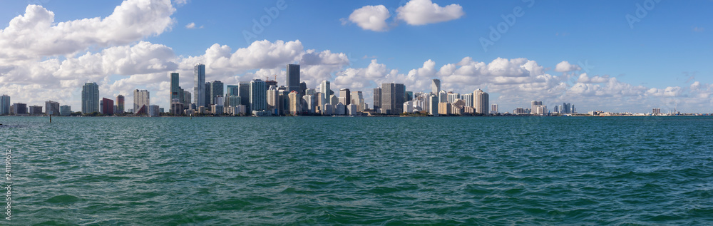 Beautiful panoramic view of a modern Downtown Cityscape during a sunny evening. Taken in Miami, Florida, United States of America.