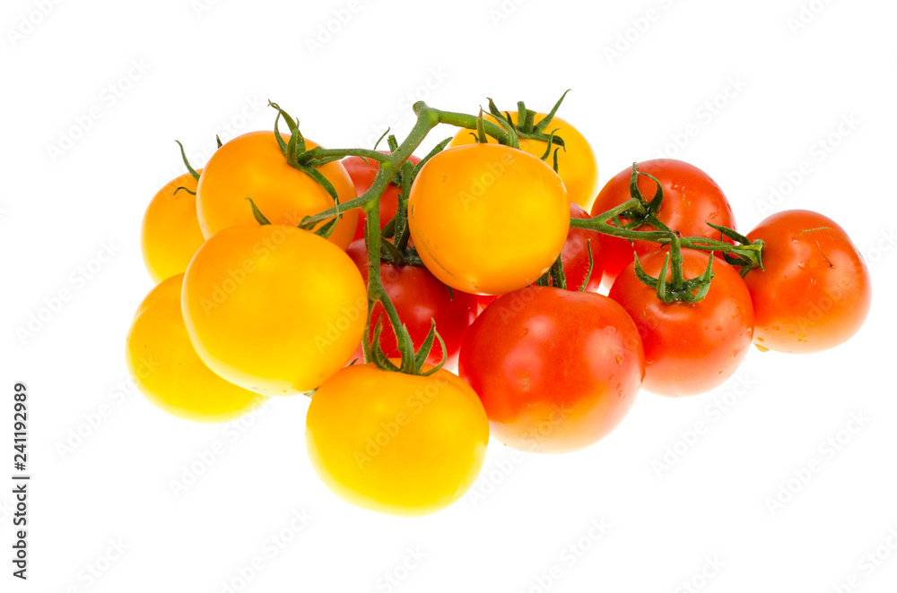 Yellow and red cherry tomatoes on white background