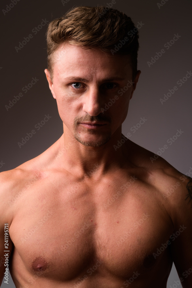 Face of muscular handsome bearded man shirtless Face of muscular handsome bearded man shirtless