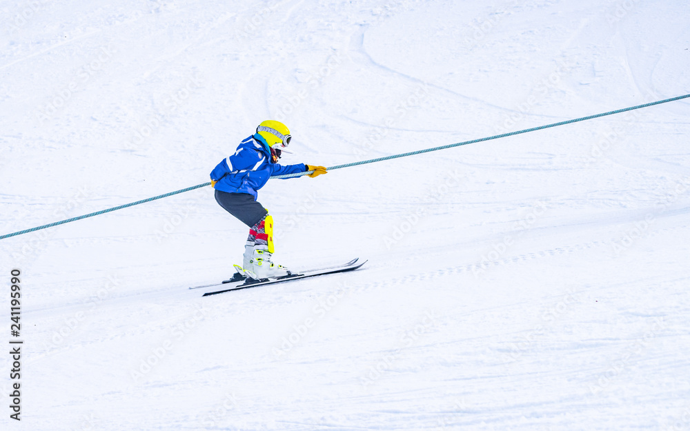 People are enjoying half-pipe skiing / snowboarding People are enjoying half-pipe skiing / snowboarding