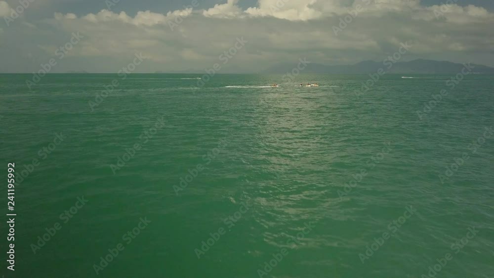 Waterjets playing around by beach -Koh Samui - Thailand Waterjets playing around by beach -Koh Samui - Thailand