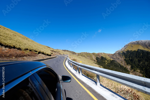 A road trip is the best way to explore New Zealand. There are blue sky, beautiful roads and landscape to be enjoyed. This was shot outside the car windows. Driving is the best way to tour the country.