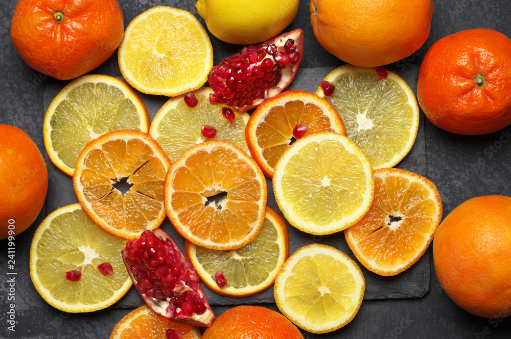 Whole and sliced citrus fruits Whole and sliced citrus fruits