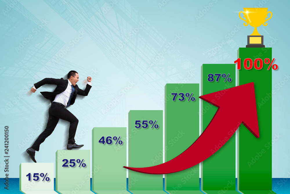 young Business man running to the top of graph young Business man running to the top of graph