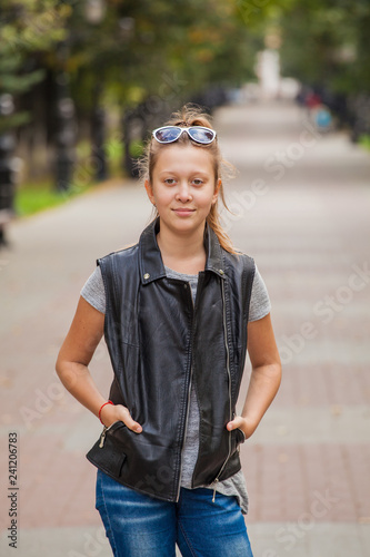 stylish modern teenager girl for a walk