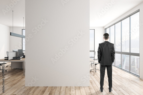 Young businessman in modern office