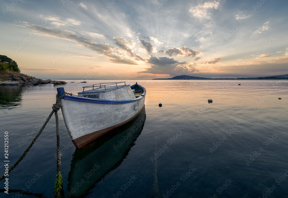 Lonely boat at sunset, near Burgas, Bulgaria