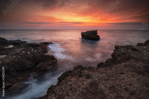 Sea sunrise, near the rocks © Ivan