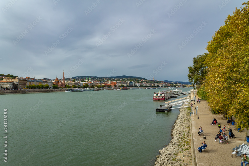 Fototapeta premium Panorama of the Danube river. View of Budapest. Old buildings of the Hungarian Parliament and medieval temples and buildings.