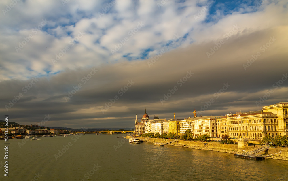 Panorama of the Danube river. View of Budapest. Old buildings of the Hungarian Parliament and medieval temples and buildings. Panorama of the Danube river. View of Budapest. Old buildings of the Hungarian Parliament and medieval temples and buildings.