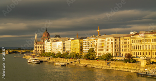 Panorama of the Danube river. View of Budapest. Old buildings of the Hungarian Parliament and medieval temples and buildings.
