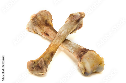 bone chicken on a white background. bones isolated on white background. Top view of a chicken bone with almost all of the meat eaten off isolated on a white background. 