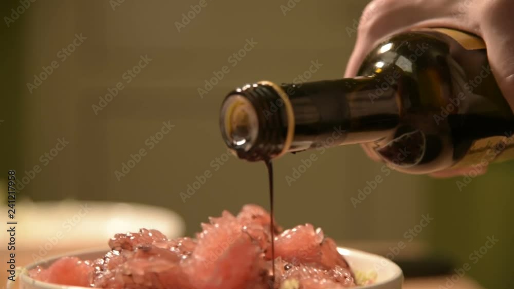close-up salad of lettuce and grapefruit is pour glass bottle balsamic vinegar. Homemade tasty and healthy food. vegetarianism. small DOF