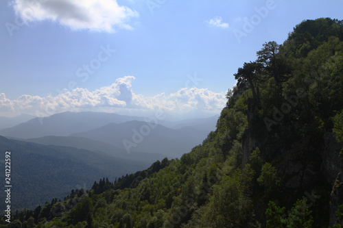 Photo of nature - fantastic petrous mountain slope with light blue sky