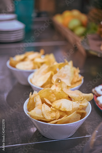 Fried potato chips in a bowl
