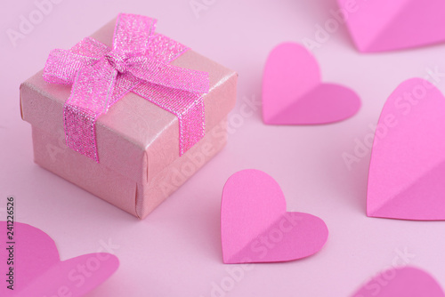Pink gift box with hearts, valentine day background