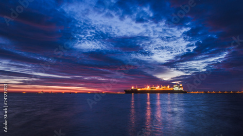 LNG TANKER - Ship at dawn moored to the gas terminal
