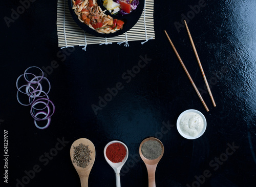 asian food, ready meal to eat in lunch box with sticks and sauce