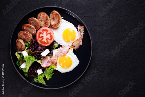 continental breakfast, countryside style meals, nourishing morning food. roasted eggs, sausage and salad