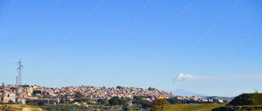 Fototapeta premium View of Mazzarino with the Mount Etna in the Background, Caltanissetta, Sicily, Italy, Europe