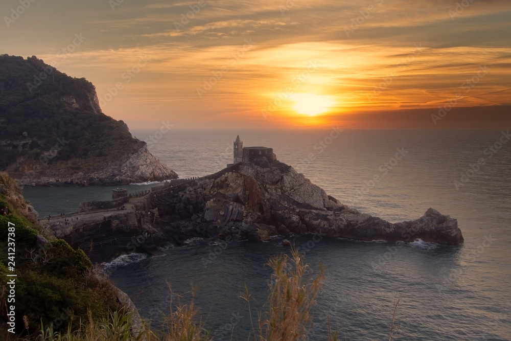 The Church of San PIetro, St. Peter, Portovenere, province of La Spezia, northern Italy, facing the Gulf of Poets. Winter sunset.