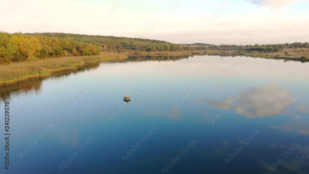 Aerial view Flight over the magnificent autumn river bank. Intact nature and fairy-tale landscape