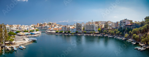 Lake in the middle of the city of Agios Nikolaos. A beautiful small town on the island of Crete, Greece.City architecture and tourist attractions.