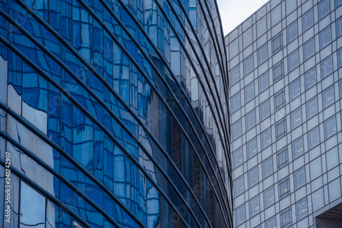Business concept - detail of a corporate building in blue tones