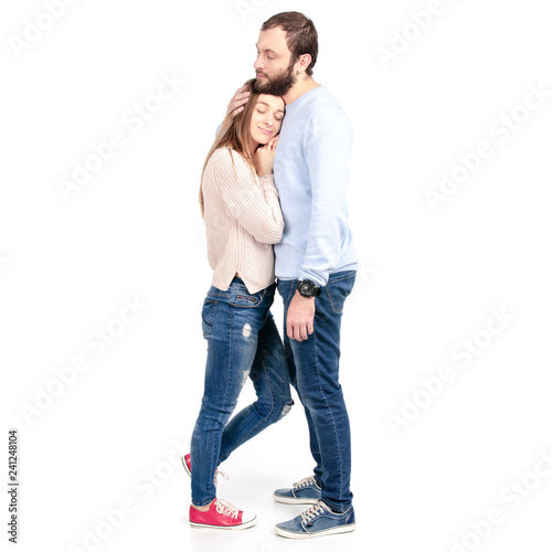 Beautiful young man and woman hug tenderness on white background isolation