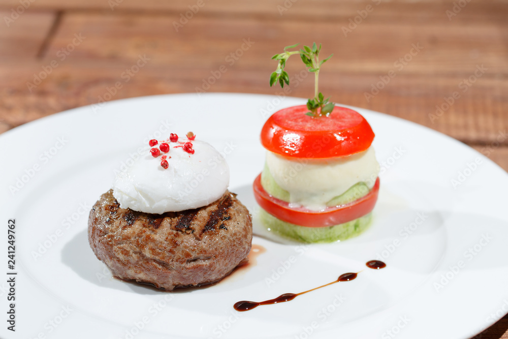 Dish with meat and eggs. Dish with meat and eggs.