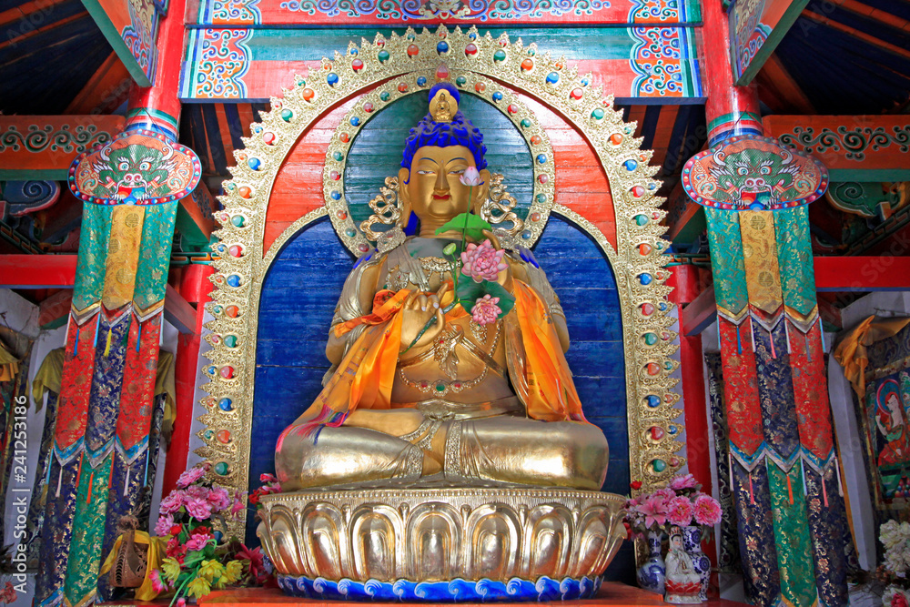 figure of Buddha and Prayer flag in the Five Pagoda Temple, Hohhot city, Inner Mongolia autonomous region, China