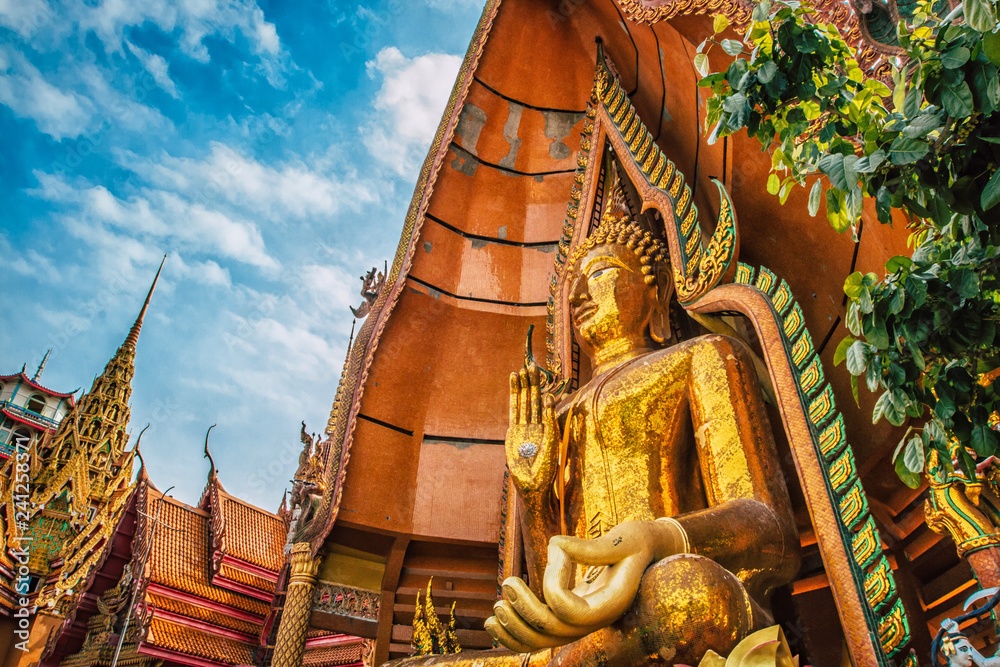 Fototapeta premium Tiger Cave Temple (Wat Tham Sua) in Kanchanaburi, Thailand is a beautiful day