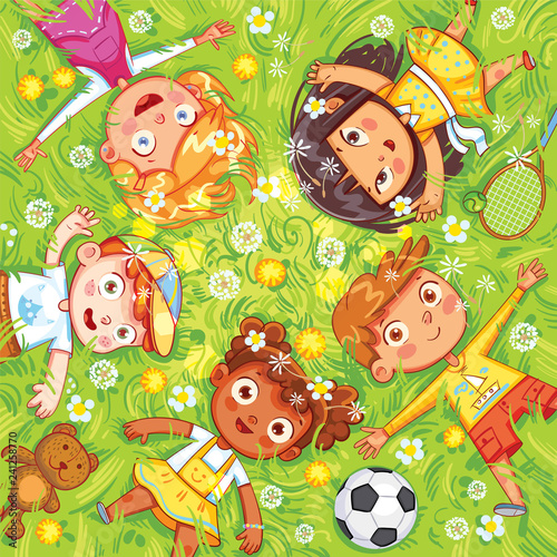 Children lie on the meadow