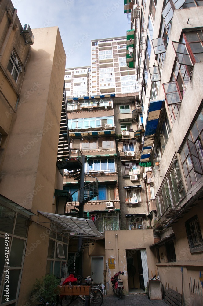 Low angle architectural view of old and new condominium in Chengdu, China Low angle architectural view of old and new condominium in Chengdu, China