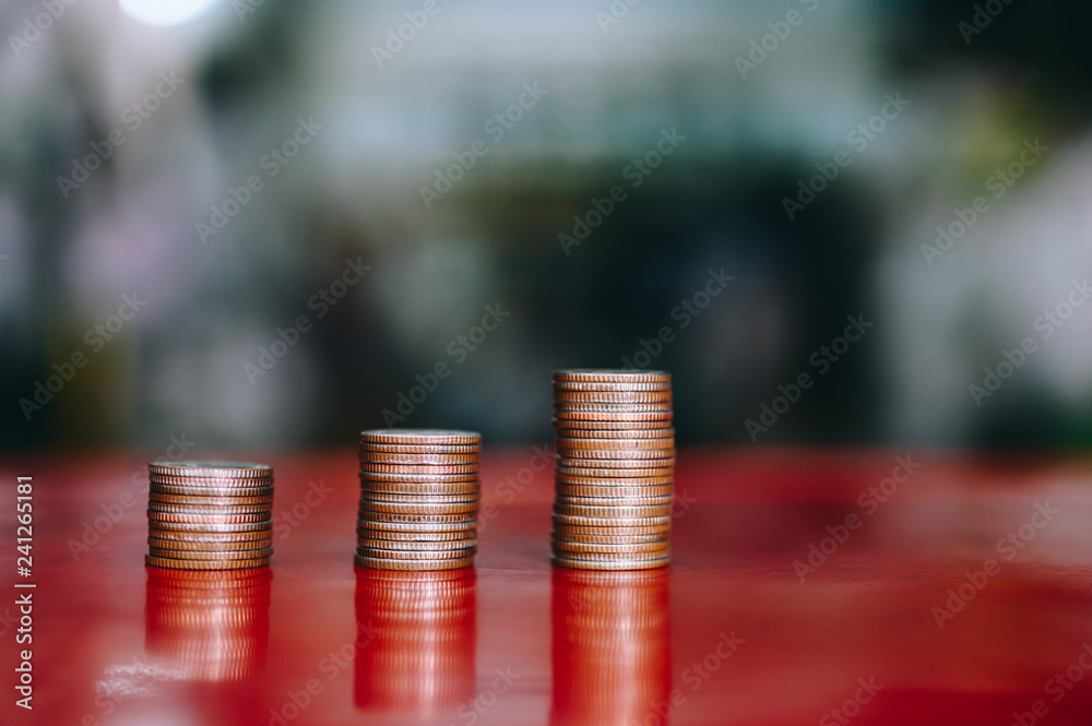 step of coins stacks, money, saving and investment or family planning concept. step of coins stacks, money, saving and investment or family planning concept.