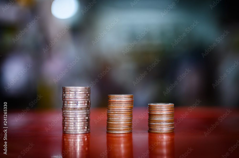 step of coins stacks, money, saving and investment or family planning concept. step of coins stacks, money, saving and investment or family planning concept.