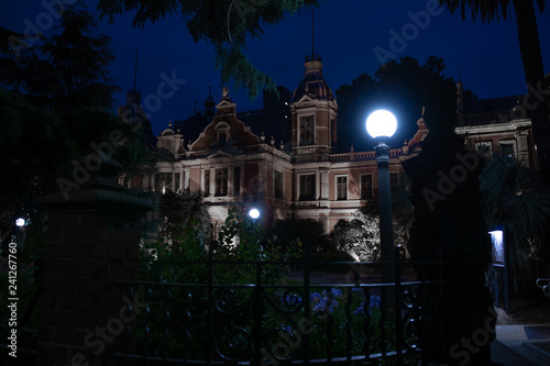 A spooky old house at night time.