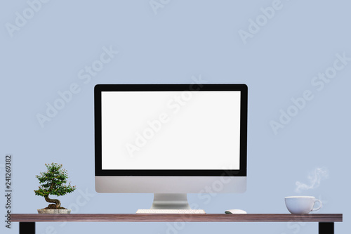 Workspace with modern desktop computer, office supplies flower plant at home or studio. Mock up