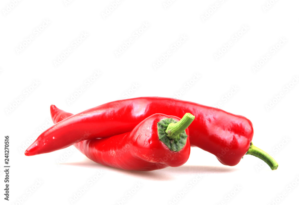 Close-Up Of Red Chili Pepper Against White Background