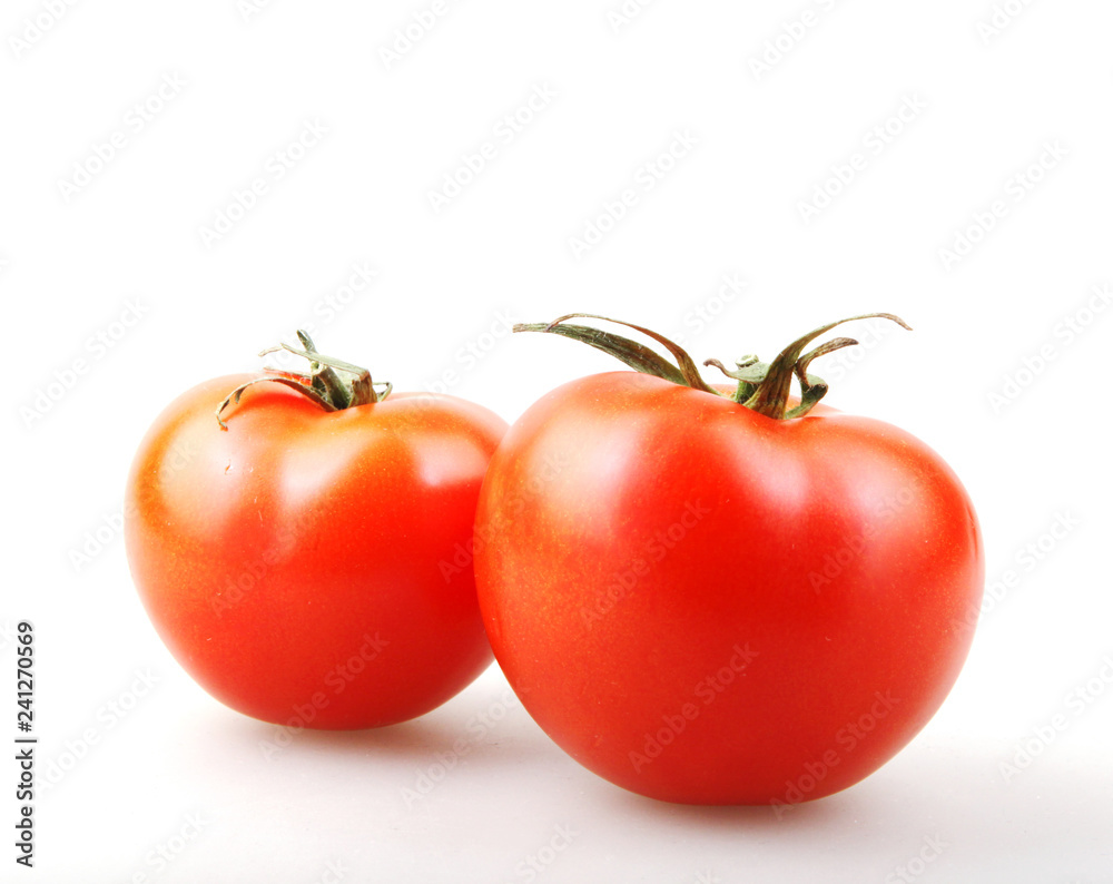 Close-Up Of Tomato Against White Background Close-Up Of Tomato Against White Background
