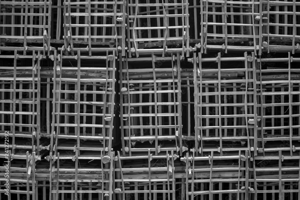 wooden grid background in black at white 