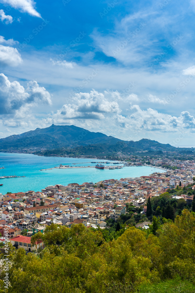 Greece, Zakynthos, Mountains, harbor and houses of zakynthos city aerial perspective