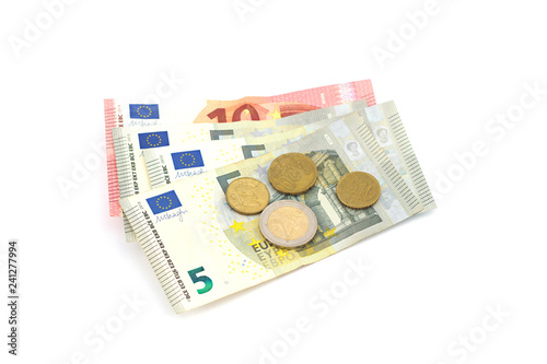 Stack of Euro banknotes and coins isolated